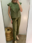 Conjunto verde con detalle Volante
