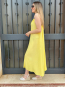 Vestido midi Amarillo de Tirantes con detalle metalico