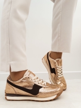 ✨ Zapatillas deportivas doradas con detalle en negro ✨