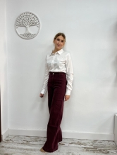 Pantalón vaquero tiro alto costura frontal Granate