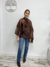 ✨ Blusa satinada con lazo al cuello y estampado animal ✨