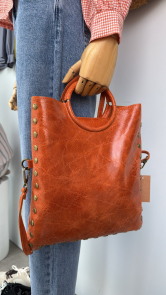 Bolso piel asa metálica